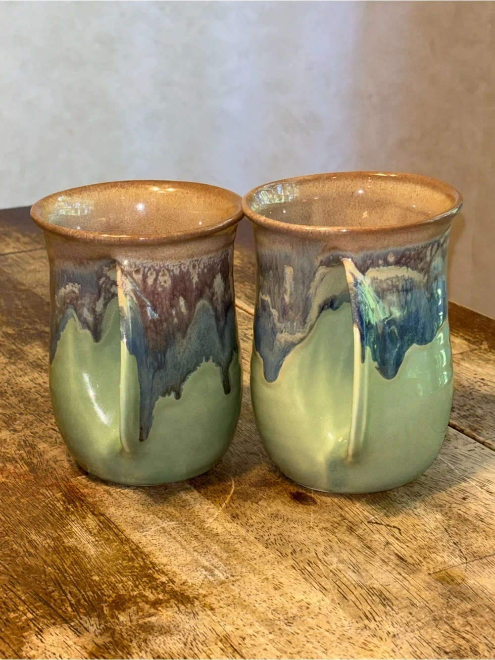 2013 & 2017 Neher Clay in Motion Mossy Creek Pottery Hand Warmer Mugs - Set of 2
